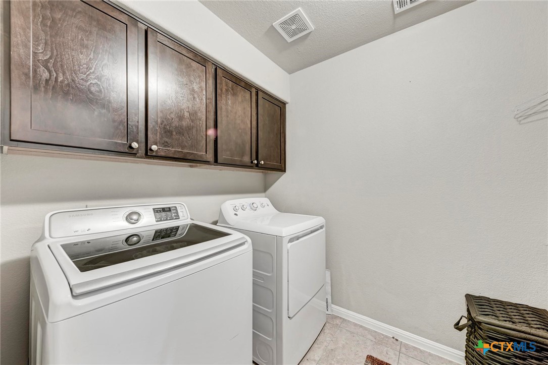 700 Cortona Cove Georgetown, TX 78628 - Photo 26 of 46 Laundry Room