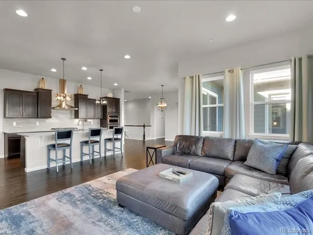 a spacious bathroom with a double vanity sink and a mirror