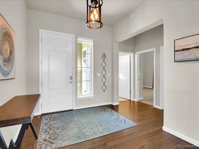 a view of livingroom with furniture and wooden floor