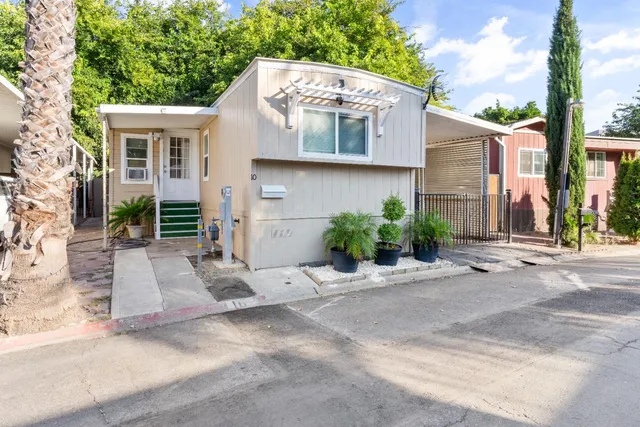 front view of a house with a small yard