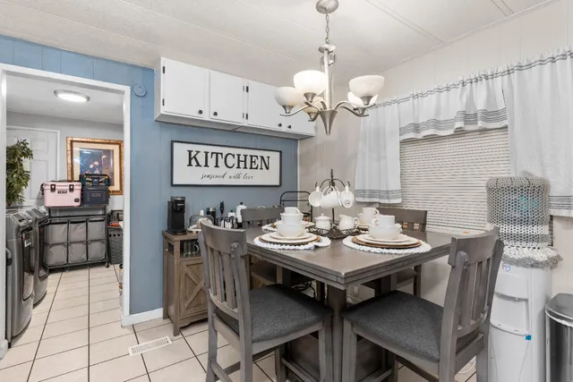 a view of a dining area and chandelier