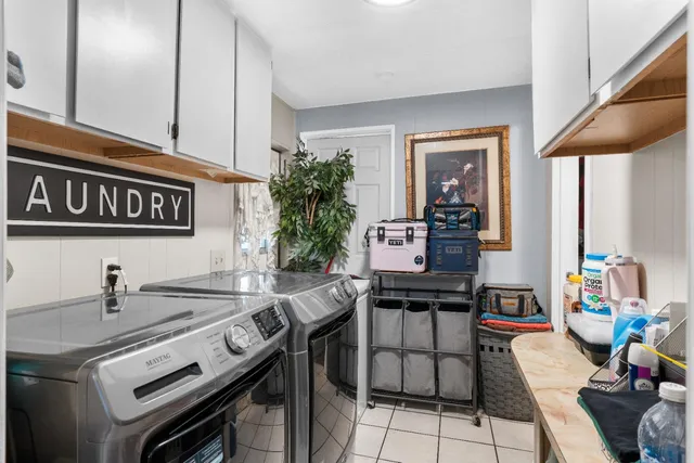 a kitchen with a stove and cabinets