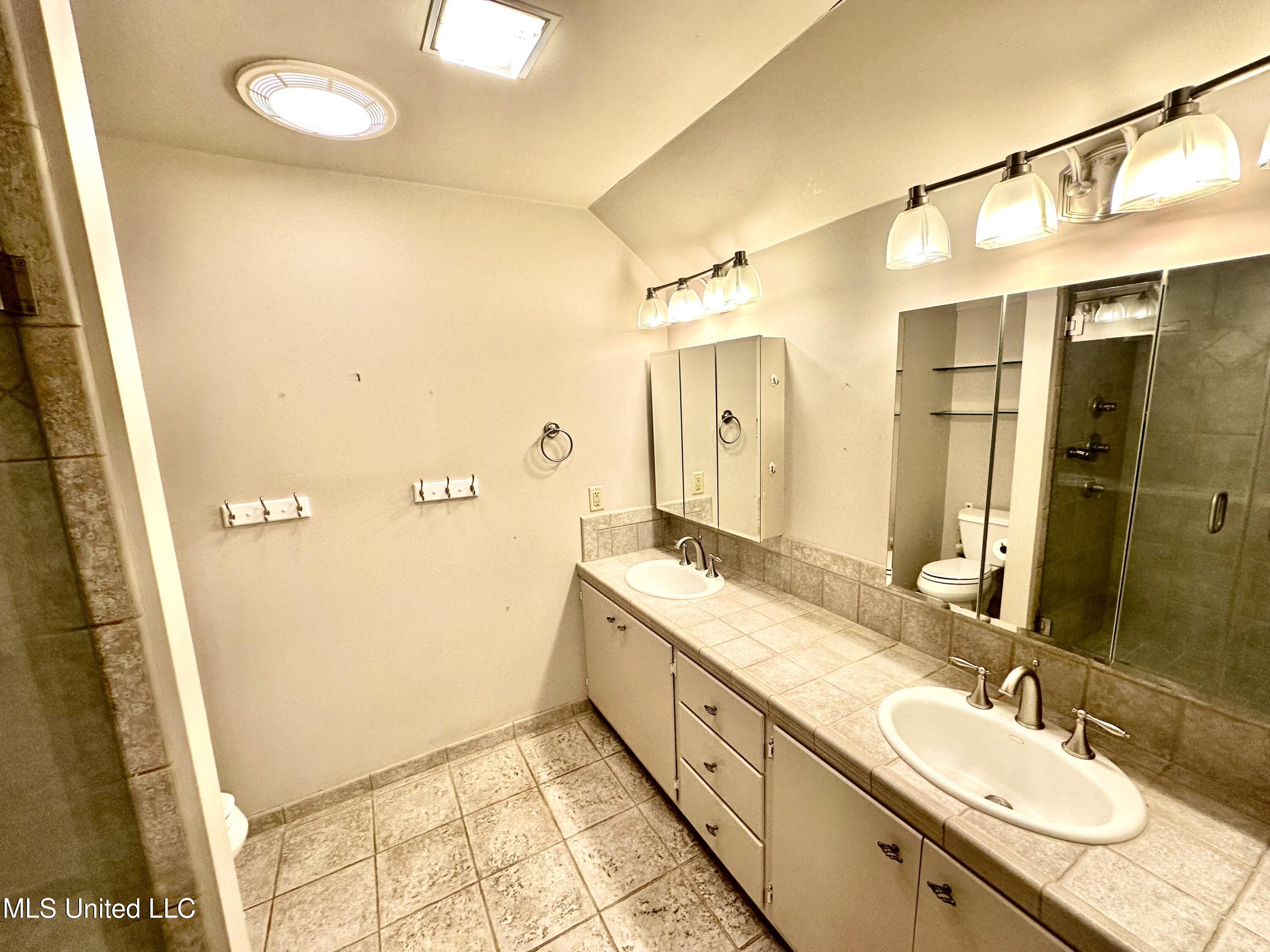 400 Charles Street Brookhaven, MS 39601 - Photo 19 of 49 Primary vanity upstairs