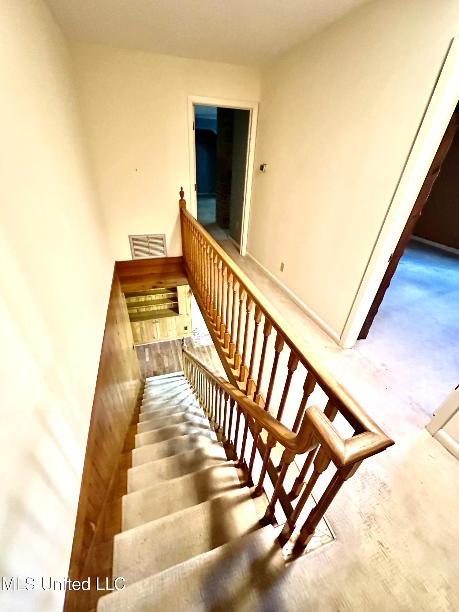 400 Charles Street Brookhaven, MS 39601 - Photo 21 of 49 Going down the stairs