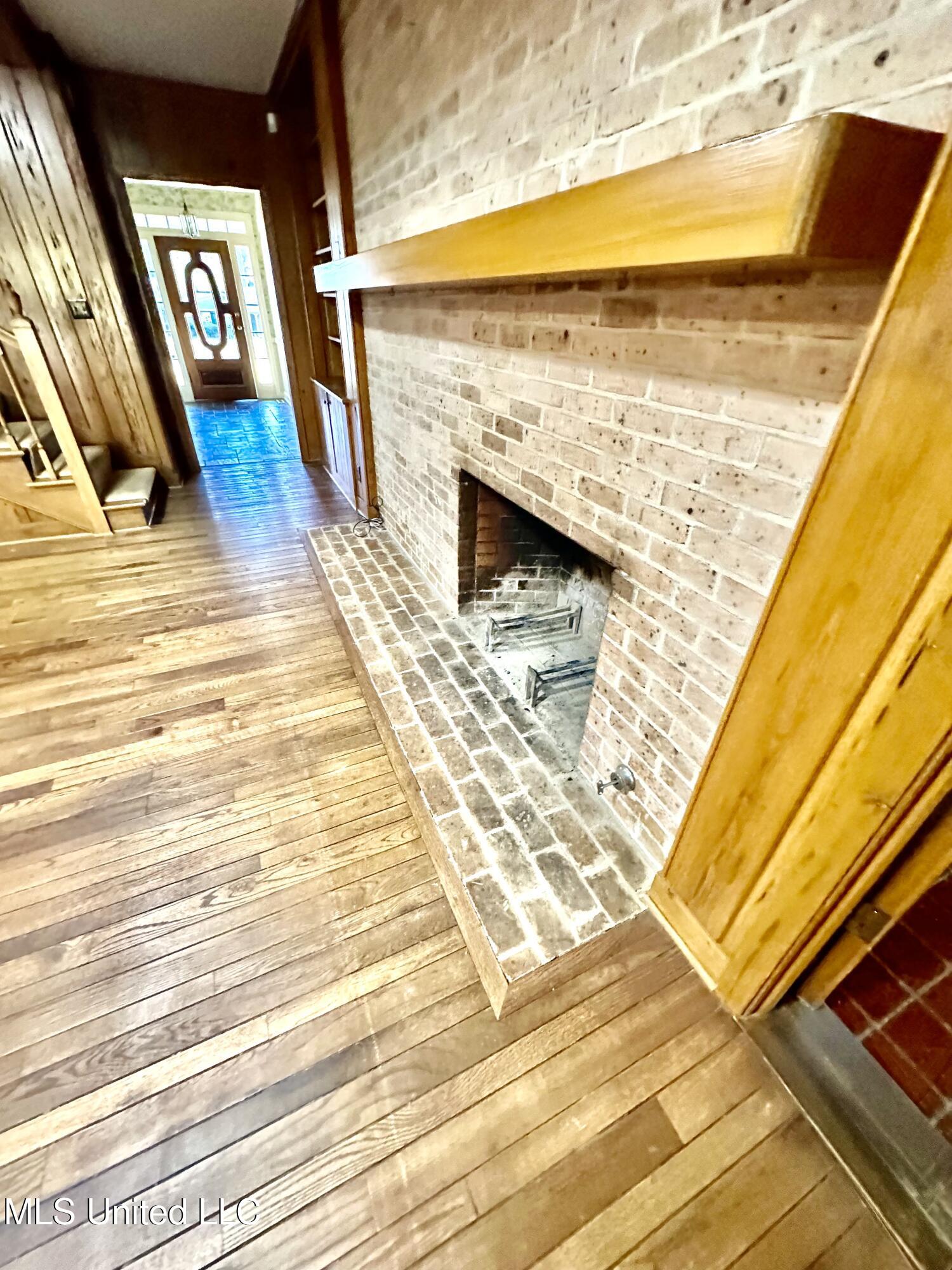 400 Charles Street Brookhaven, MS 39601 - Photo 25 of 49 Den fireplace with gas starter