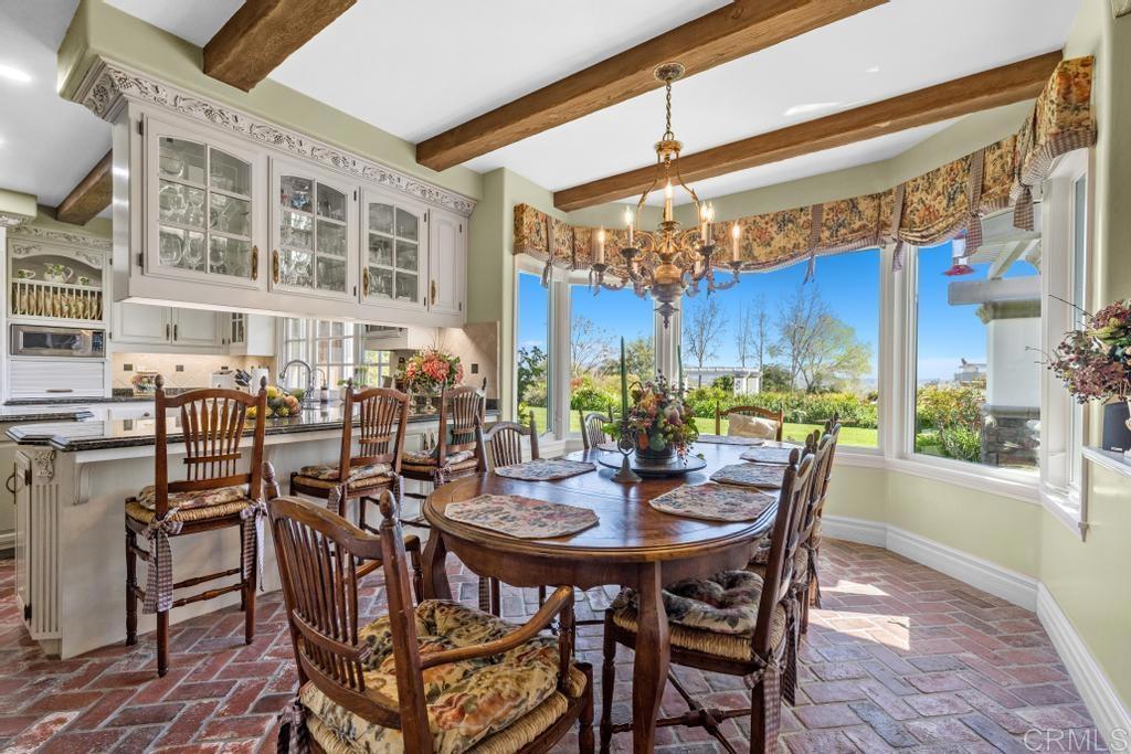 27 Shady Hill Lane Fallbrook, CA 92028 - Photo 11 of 75 a view of a dining table and chairs in the patio