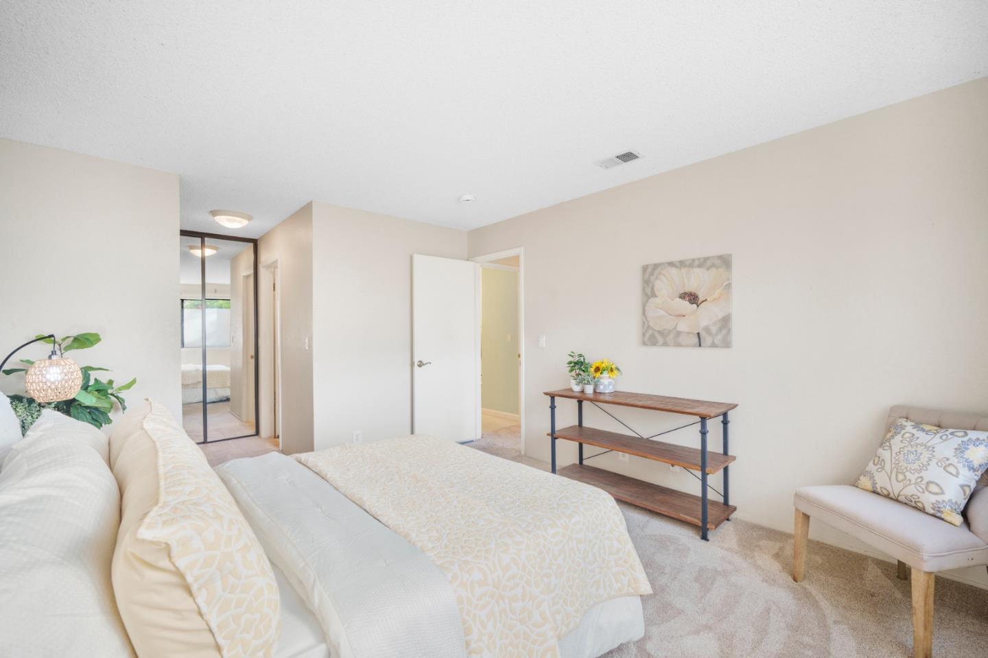 1204 La Terrace Circle San Jose, CA 95123 - Photo 13 of 26 a bedroom with a bed and a couch