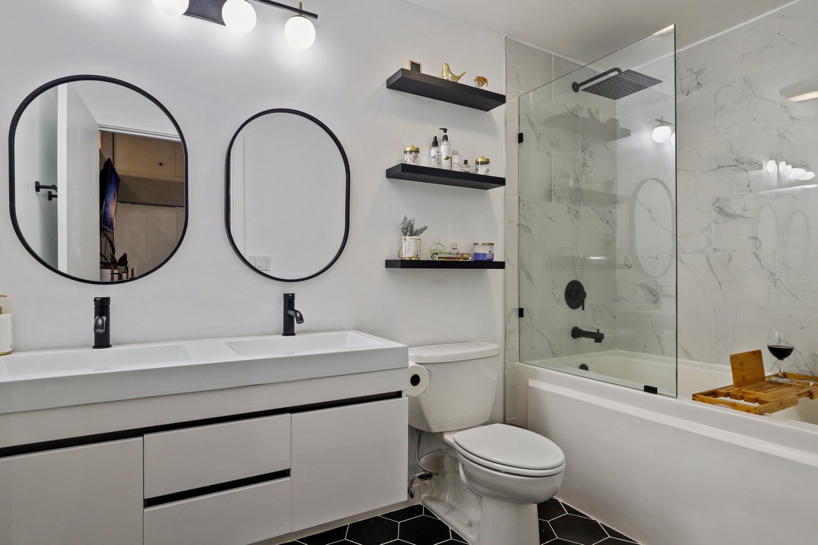 1111 West 15th Street, Unit 113 Chicago, IL 60608 - Photo 17 of 34 a bathroom with a toilet sink and mirror