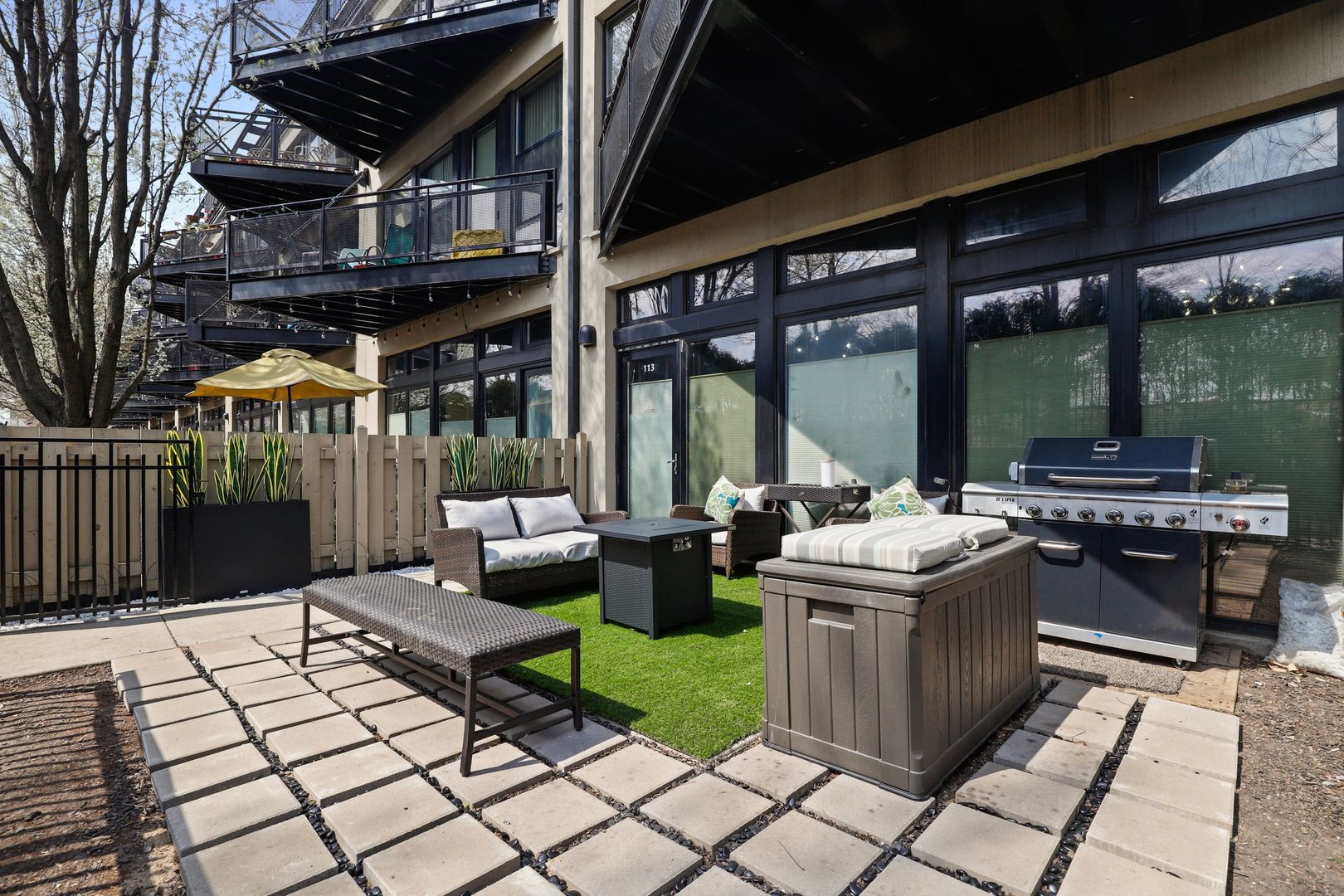 1111 West 15th Street, Unit 113 Chicago, IL 60608 - Photo 22 of 34 a view of an outdoor kitchen