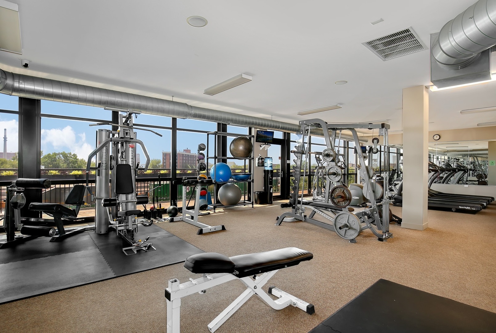 1111 West 15th Street, Unit 113 Chicago, IL 60608 - Photo 28 of 34 a view of a room with gym equipment