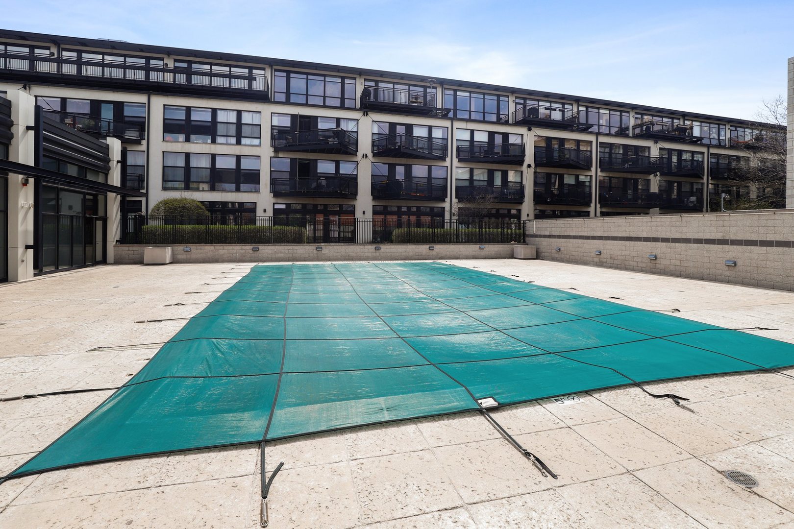 1111 West 15th Street, Unit 113 Chicago, IL 60608 - Photo 31 of 34 a view of entrance gate of a building