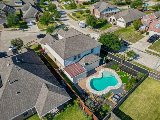 an aerial view of house with outdoor space