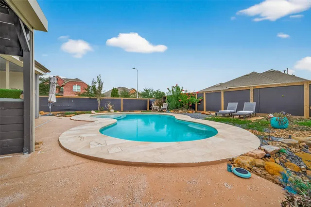 a view of outdoor space yard and swimming pool