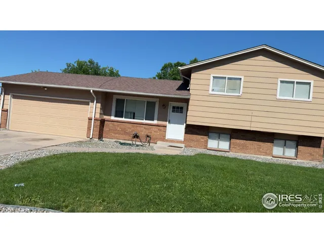 a black and white photo of a house