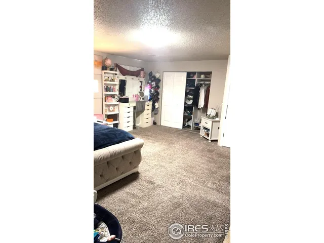 a bathroom with a shower and a sink