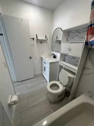 a view of a bathroom with a sink and toilet