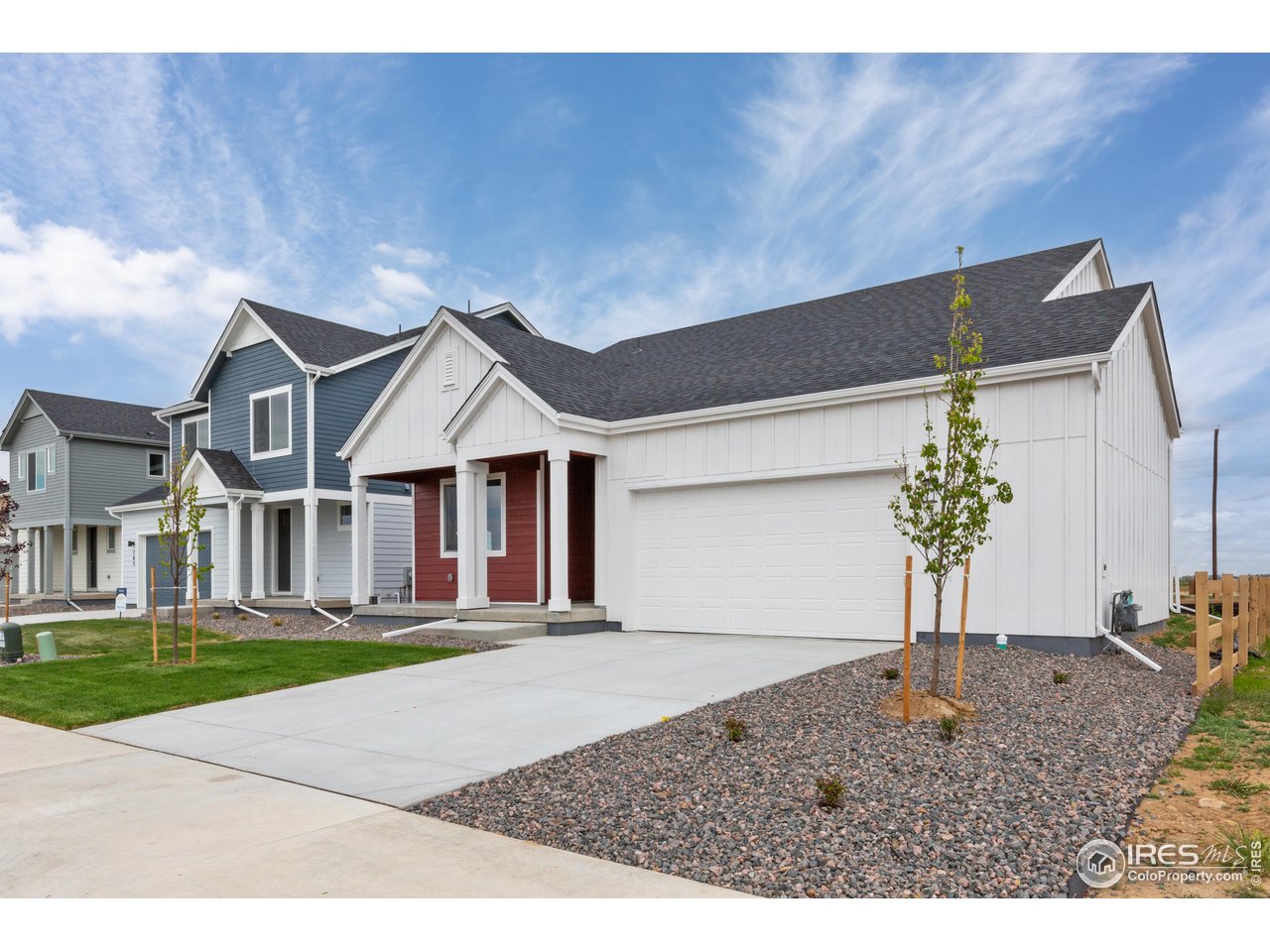 797 Muturu Road Johnstown, CO 80534 - Photo 2 of 26 a front view of a house with a yard