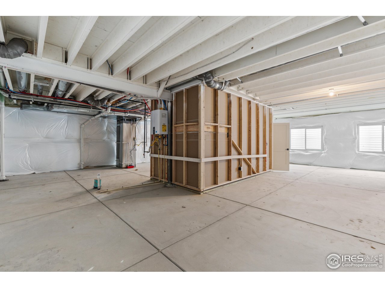 797 Muturu Road Johnstown, CO 80534 - Photo 22 of 26 a view of an empty room with a window