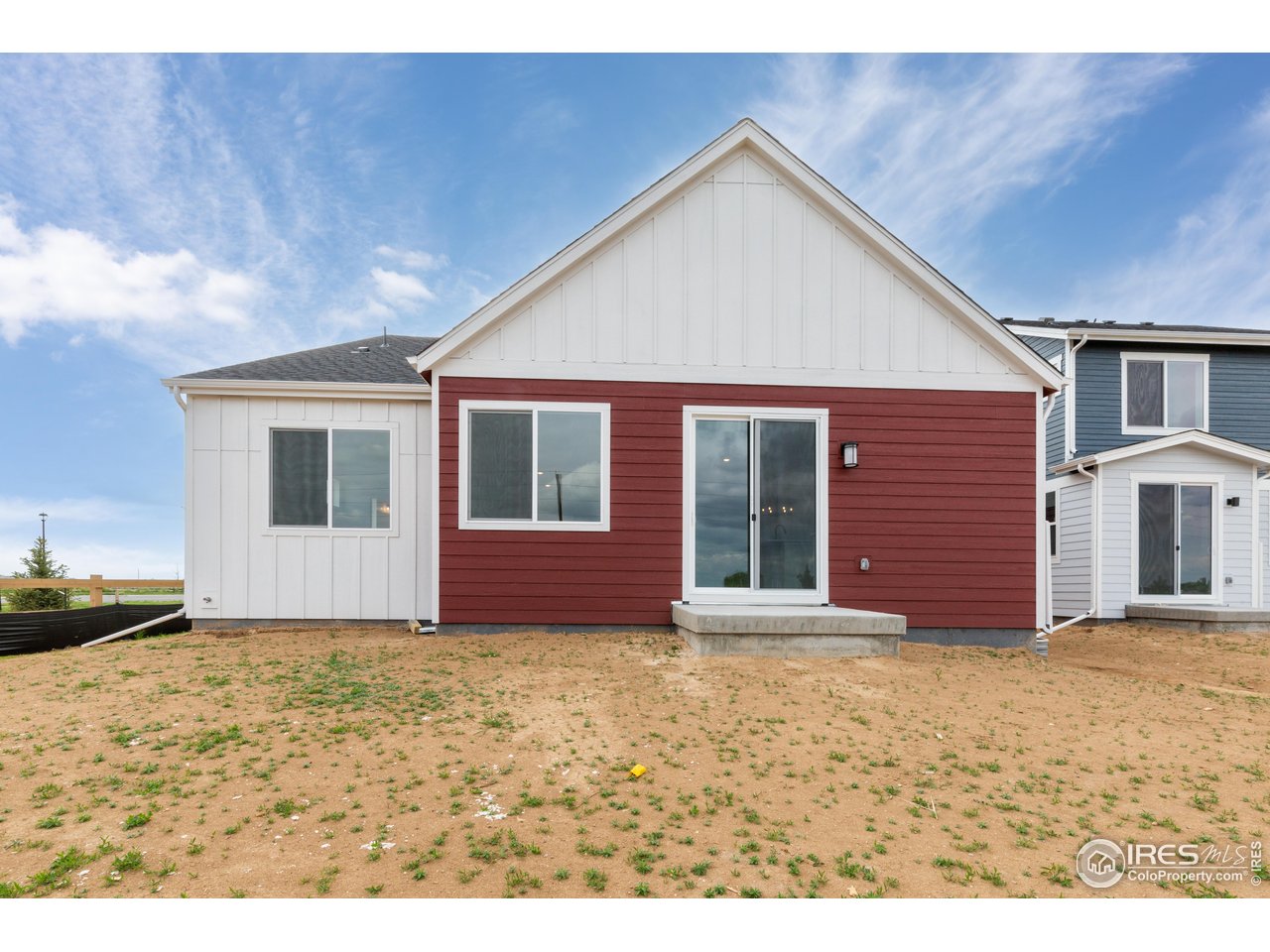797 Muturu Road Johnstown, CO 80534 - Photo 23 of 26 a front view of a house with a garden