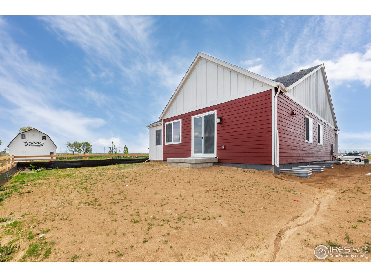 797 Muturu Road Johnstown, CO 80534 - Photo 25 of 26 a view of a house with a yard