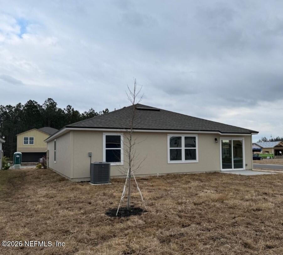12420 Russian Olive Road Jacksonville, FL 32218 - Photo 6 of 36 a backyard of a house with lots of trees