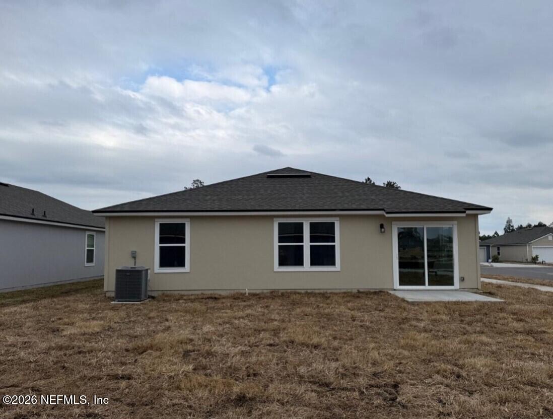 12420 Russian Olive Road Jacksonville, FL 32218 - Photo 8 of 36 front view of a house with a dry yard
