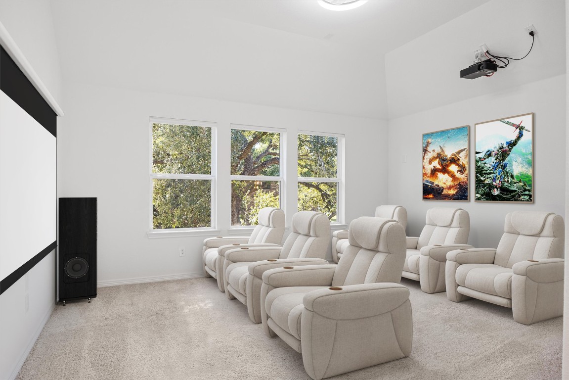 1132 Spring Gulch Lane Georgetown, TX 78628 - Photo 21 of 36 a living room with furniture and a flat screen tv