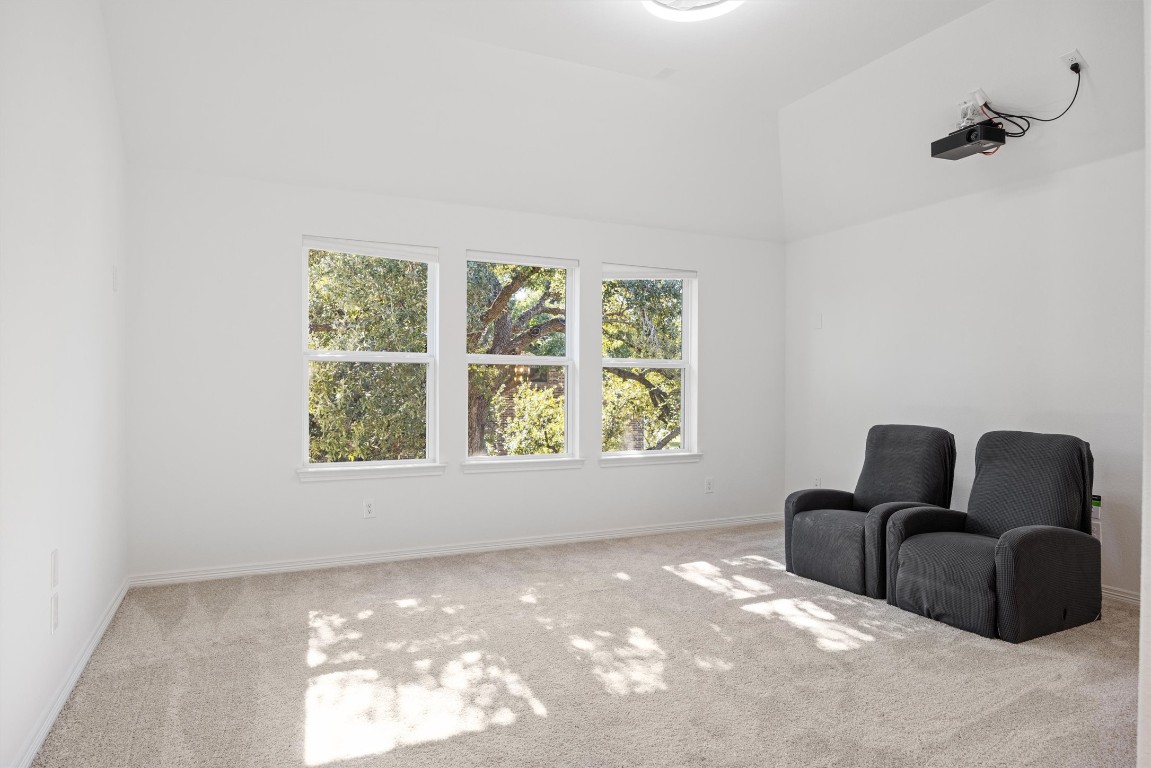 1132 Spring Gulch Lane Georgetown, TX 78628 - Photo 22 of 36 an empty room with windows and yard