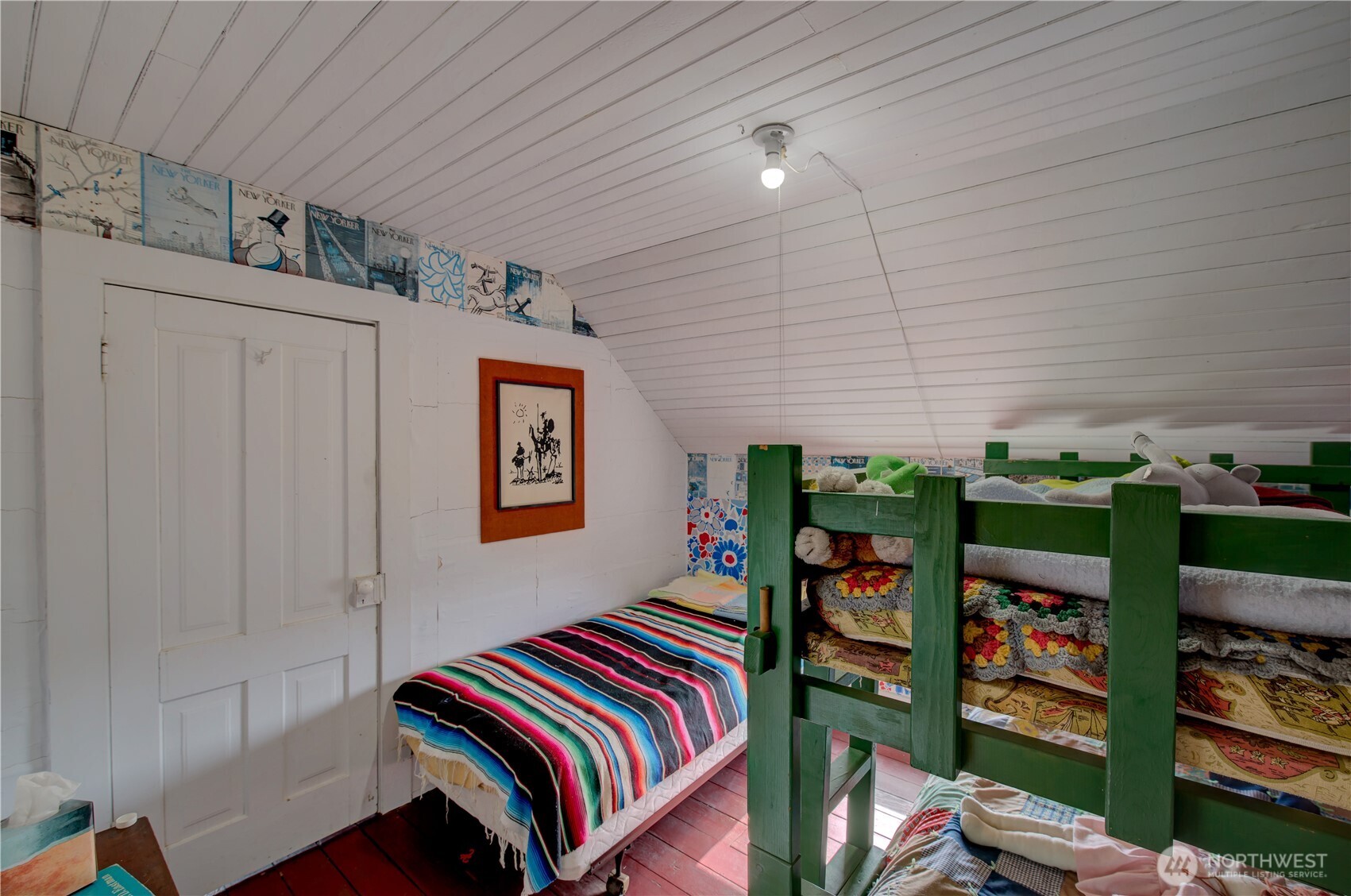 209 3rd Street Southeast Long Beach, WA 98631 - Photo 17 of 28 a bedroom with bed and a closet