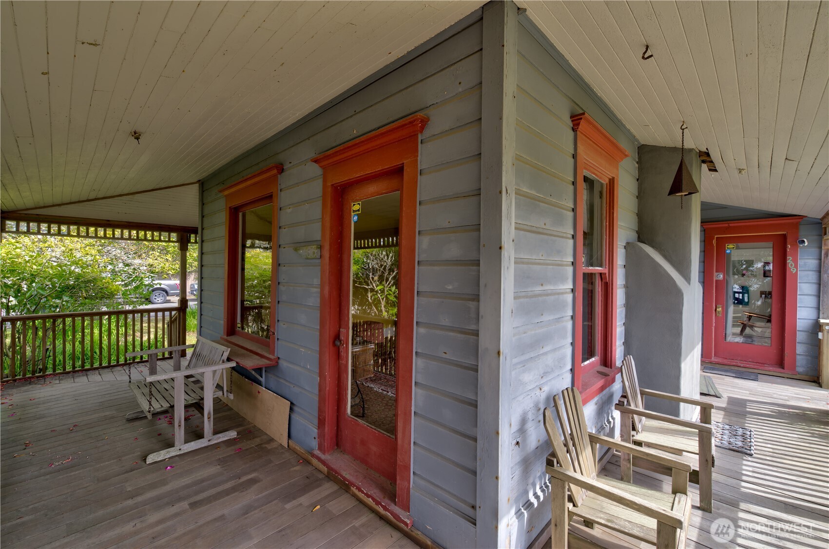 209 3rd Street Southeast Long Beach, WA 98631 - Photo 24 of 28 a view of a porch with a table and chairs