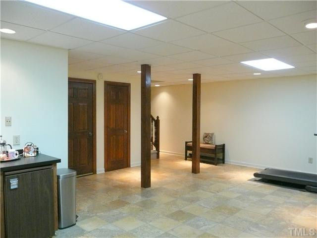 10300 Whitestone Road Raleigh, NC 27615 - Photo 18 of 25 Gorgeous tile floor in this finished basement bonus room. Basement