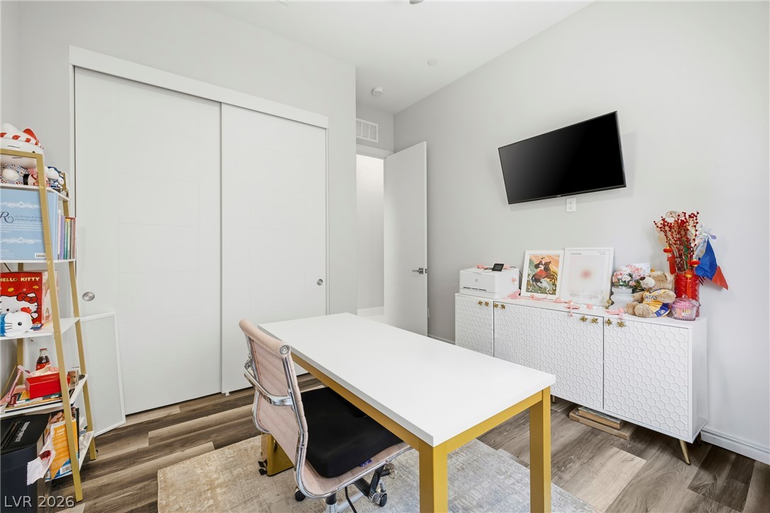 45 Garibaldi Way Henderson, NV 89011 - Photo 29 of 74 An inviting study with hard surface flooring offers a productive and comfortable workspace.