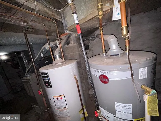 a view of a kitchen with wooden floor and a sink