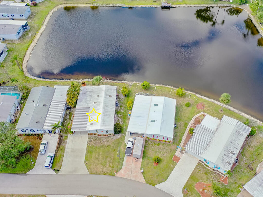 269 Riverwood Road Naples, FL 34114 - Photo 1 of 32 an aerial view of a swimming pool
