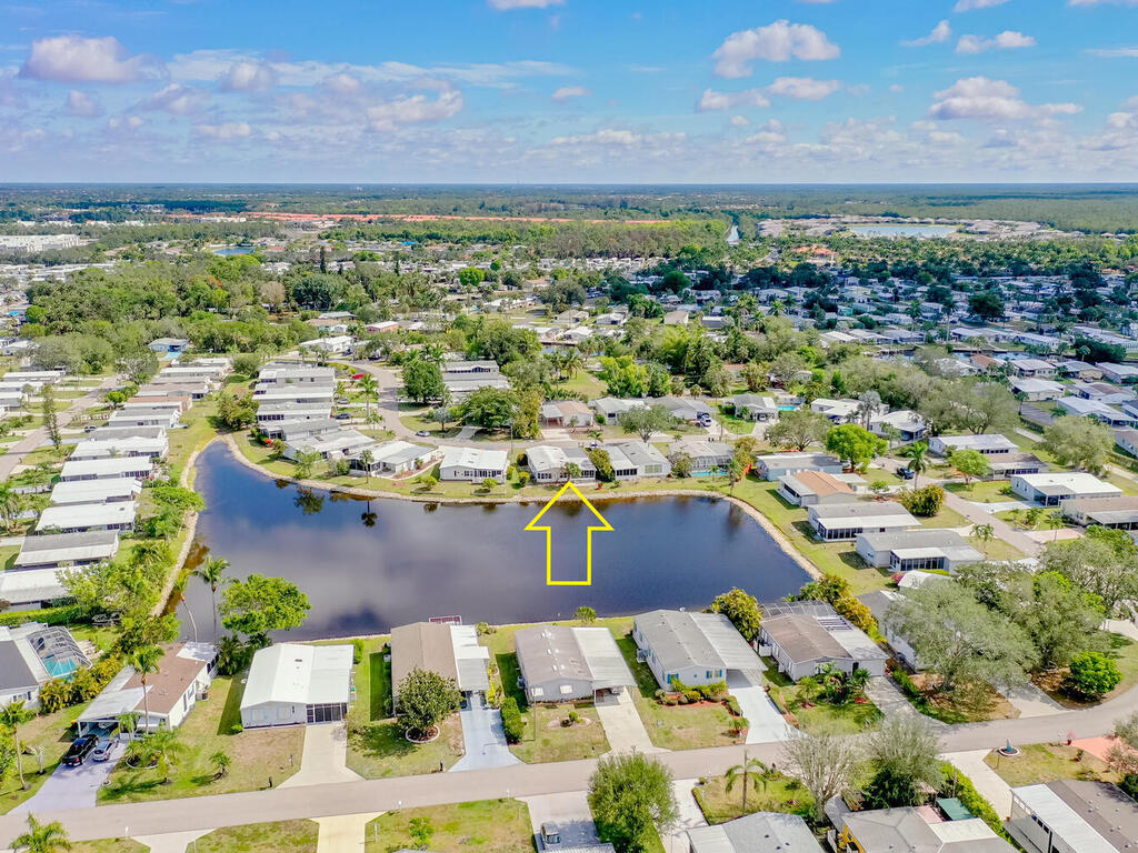 269 Riverwood Road Naples, FL 34114 - Photo 25 of 32 a view of a city