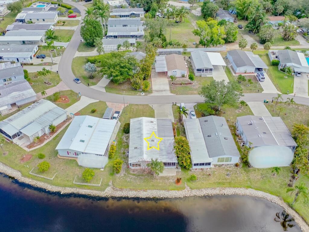 269 Riverwood Road Naples, FL 34114 - Photo 31 of 32 an aerial view of residential houses with outdoor space