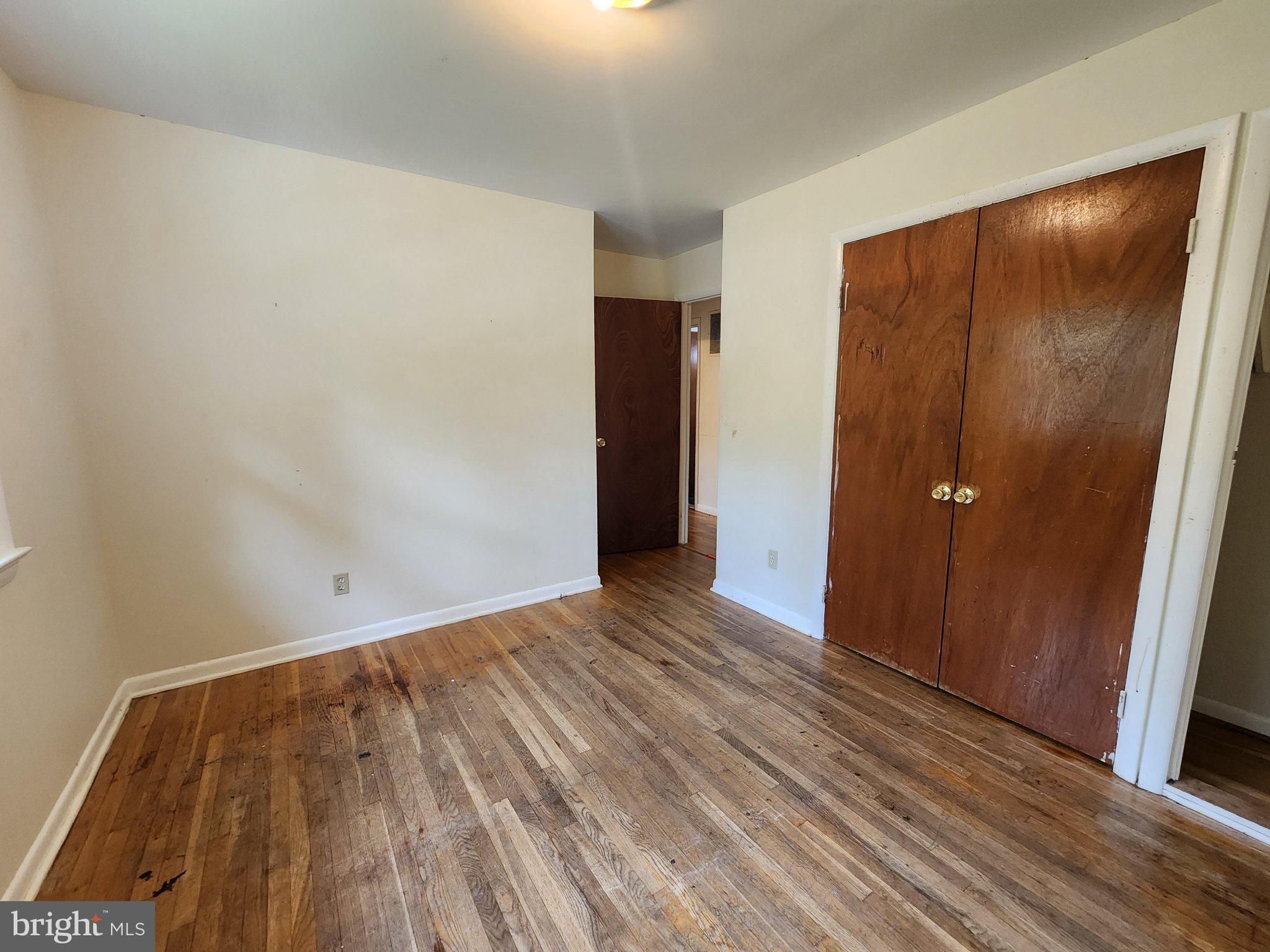 2005 Prichard Road Silver Spring, MD 20902 - Photo 15 of 26 Spacious room with warm wood floors.