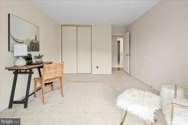 a bathroom with a shower and a sink