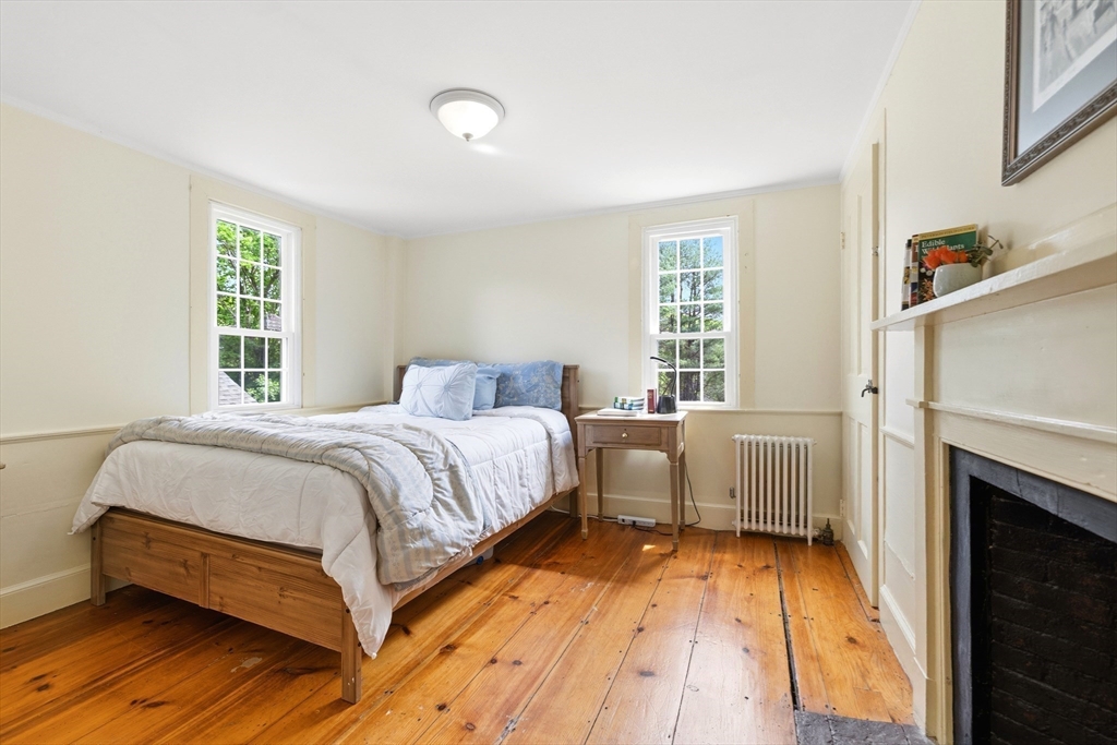 22 Stinson Road Andover, MA 01810 - Photo 32 of 40 a spacious bedroom with a bed and a large window