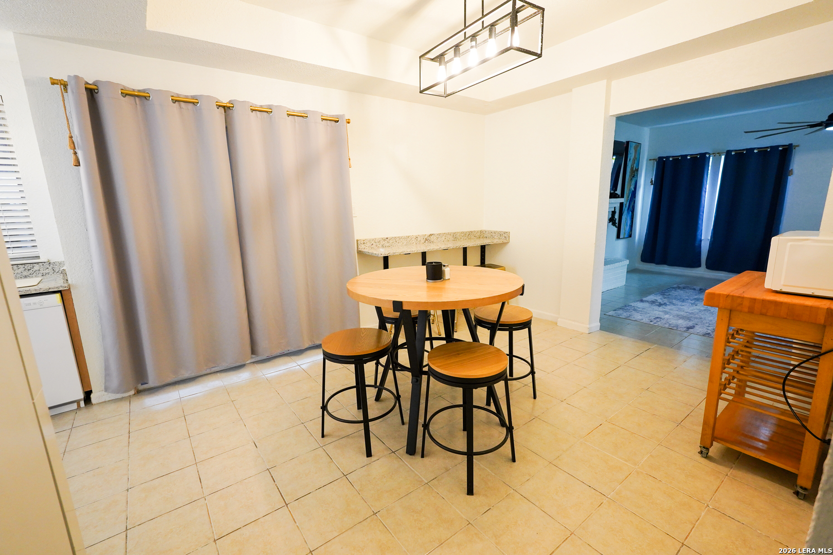 1823 Copperfield Road San Antonio, TX 78251 - Photo 11 of 25 a dining room with furniture and a rug