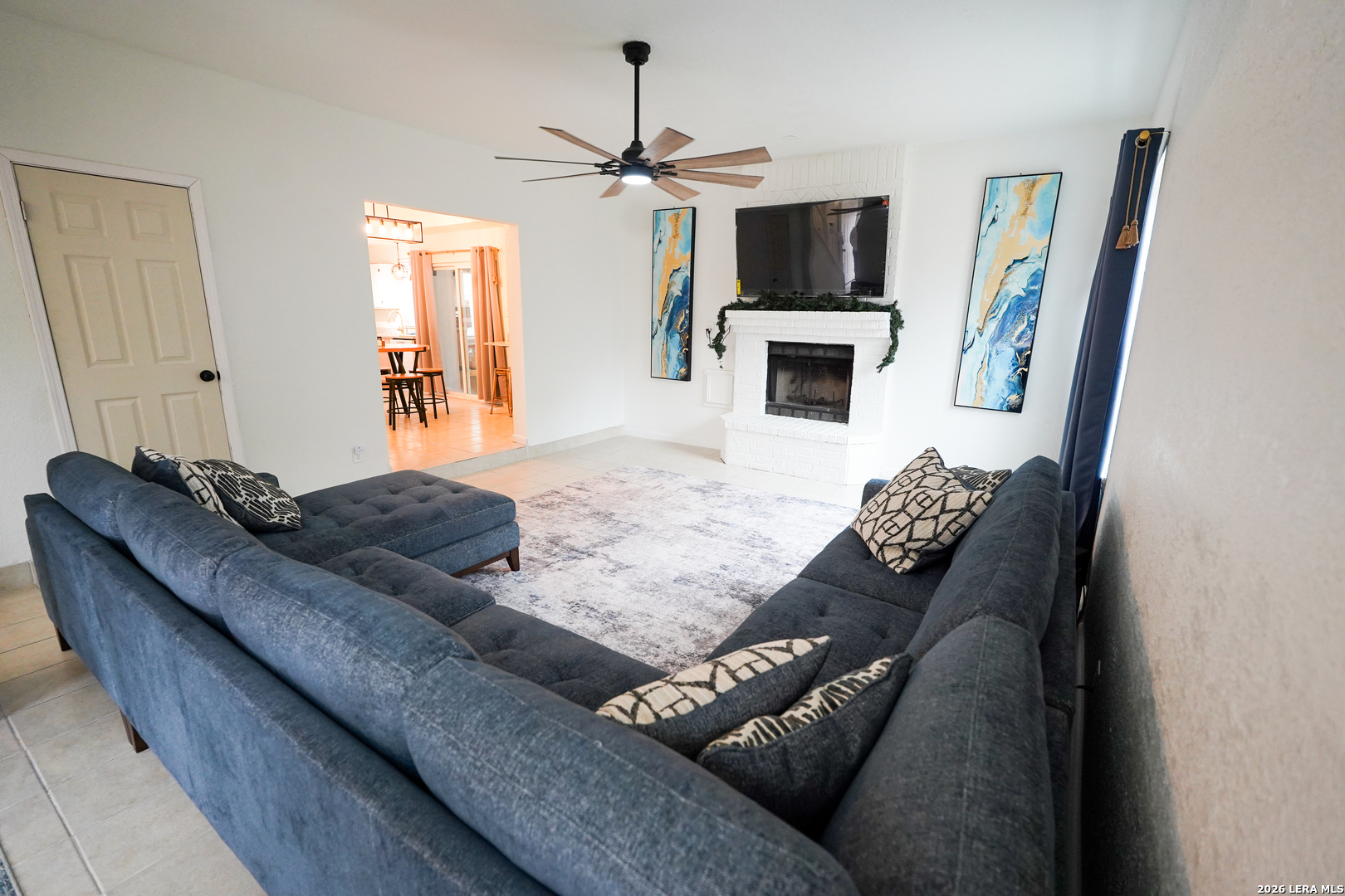 1823 Copperfield Road San Antonio, TX 78251 - Photo 9 of 25 a living room with furniture and a flat screen tv