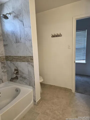 a bathroom with a bathtub