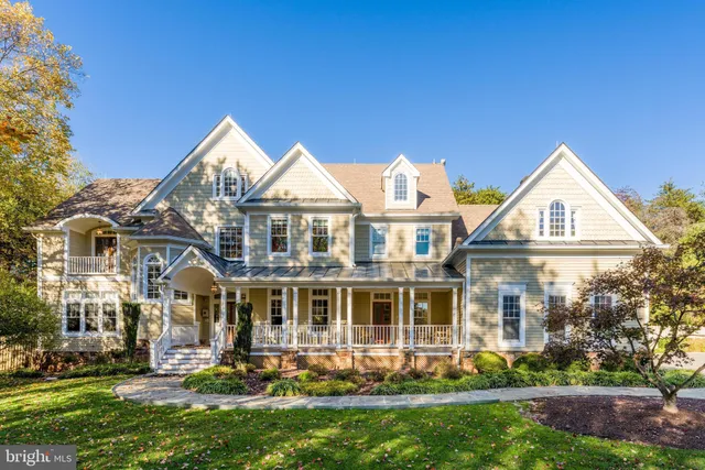 a view of a street with houses on both side