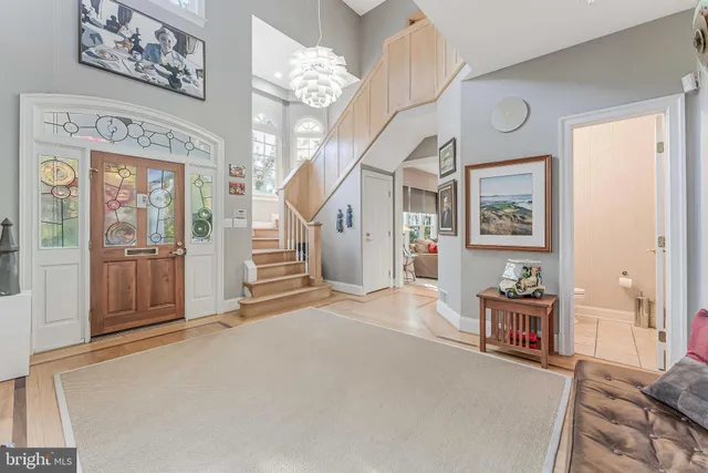 a living room with fireplace furniture and a flat screen tv