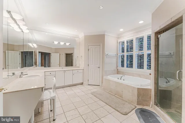 a kitchen with stainless steel appliances granite countertop a sink and a microwave oven