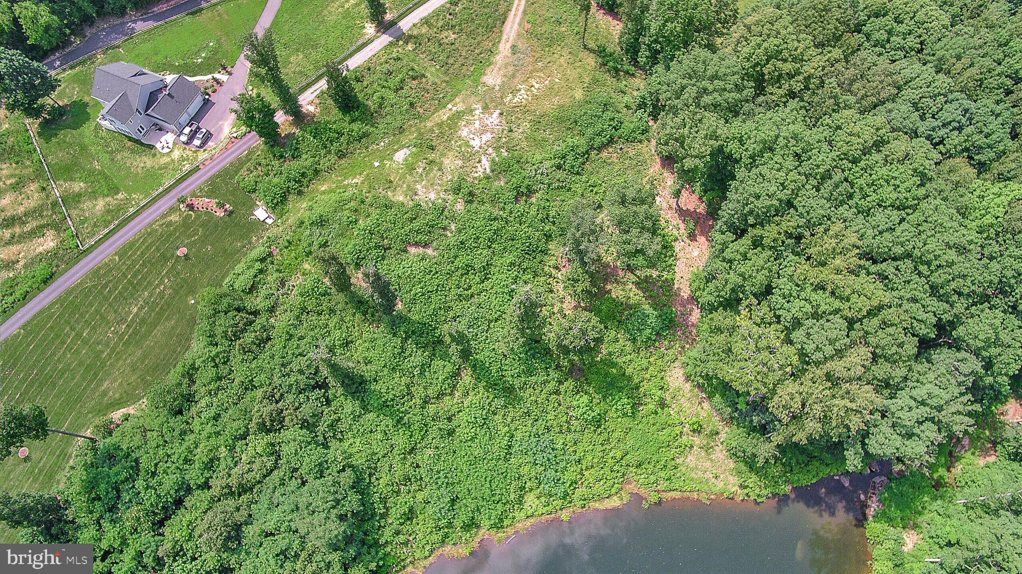 137 Rocky Run Road Fredericksburg, VA 22406 - Photo 21 of 25 an aerial view of residential houses with outdoor space and trees