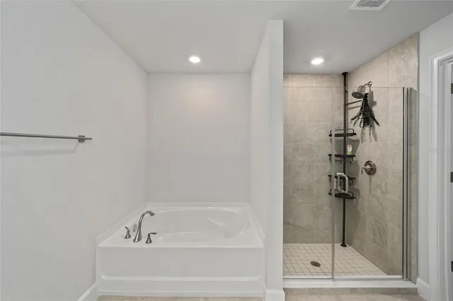 an empty room with walk in closet and closet