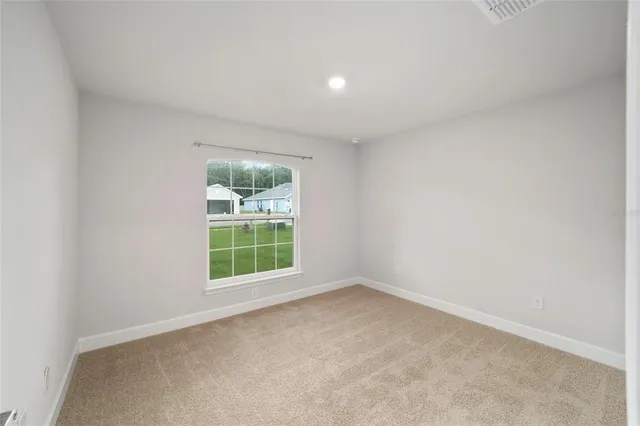 a view of storage and utility room with washer and dryer