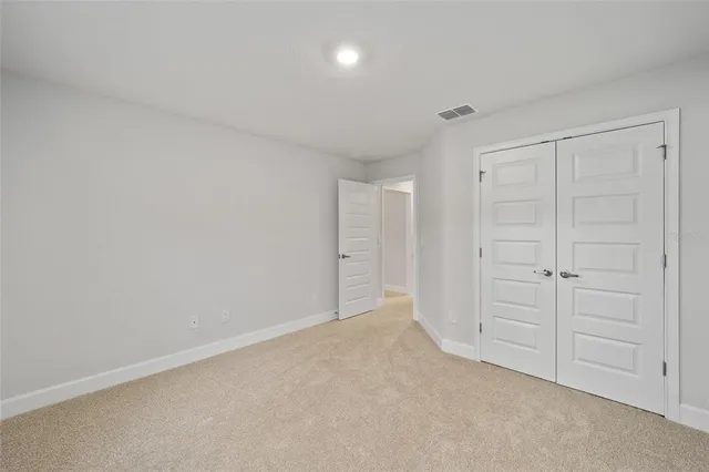 a view of a house with a big yard