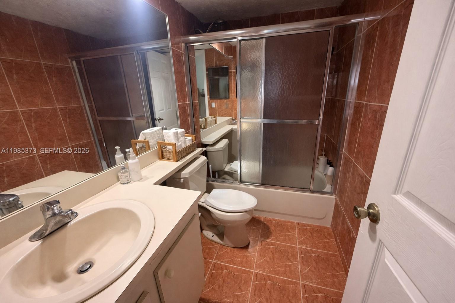 18216 Mediterranean Boulevard, Unit 119 Hialeah, FL 33015 - Photo 13 of 30 In-suit bathroom